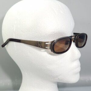 Calvin Klein CK1012-11 103 Sunglasses Bronze Tone Oval Sport Eyewear 50/24